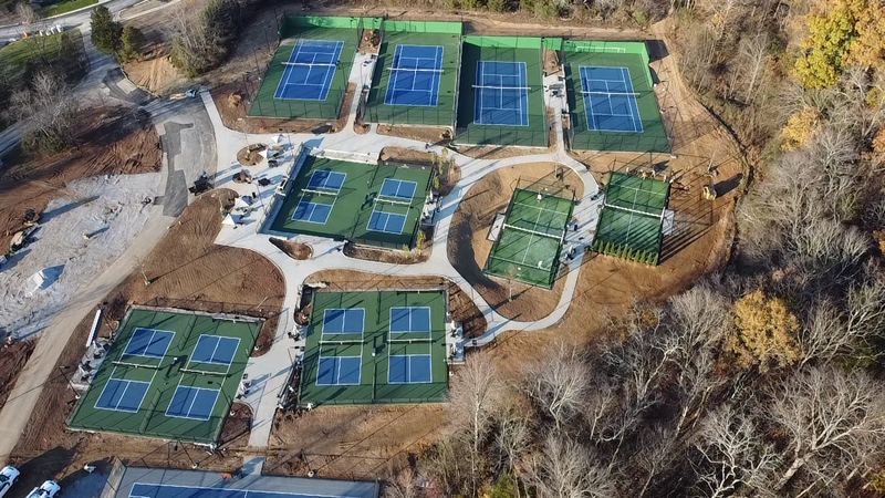 A new club with padel, tennis and pickleball courts, seen from above