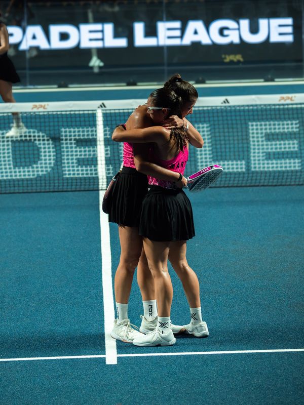Marta Morga and her partner celebrating a Pro Padel League win