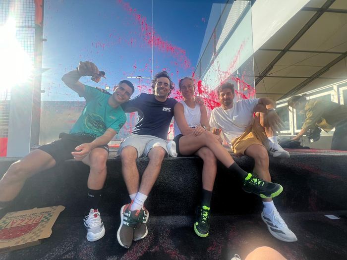 Santi relaxing with players between matches